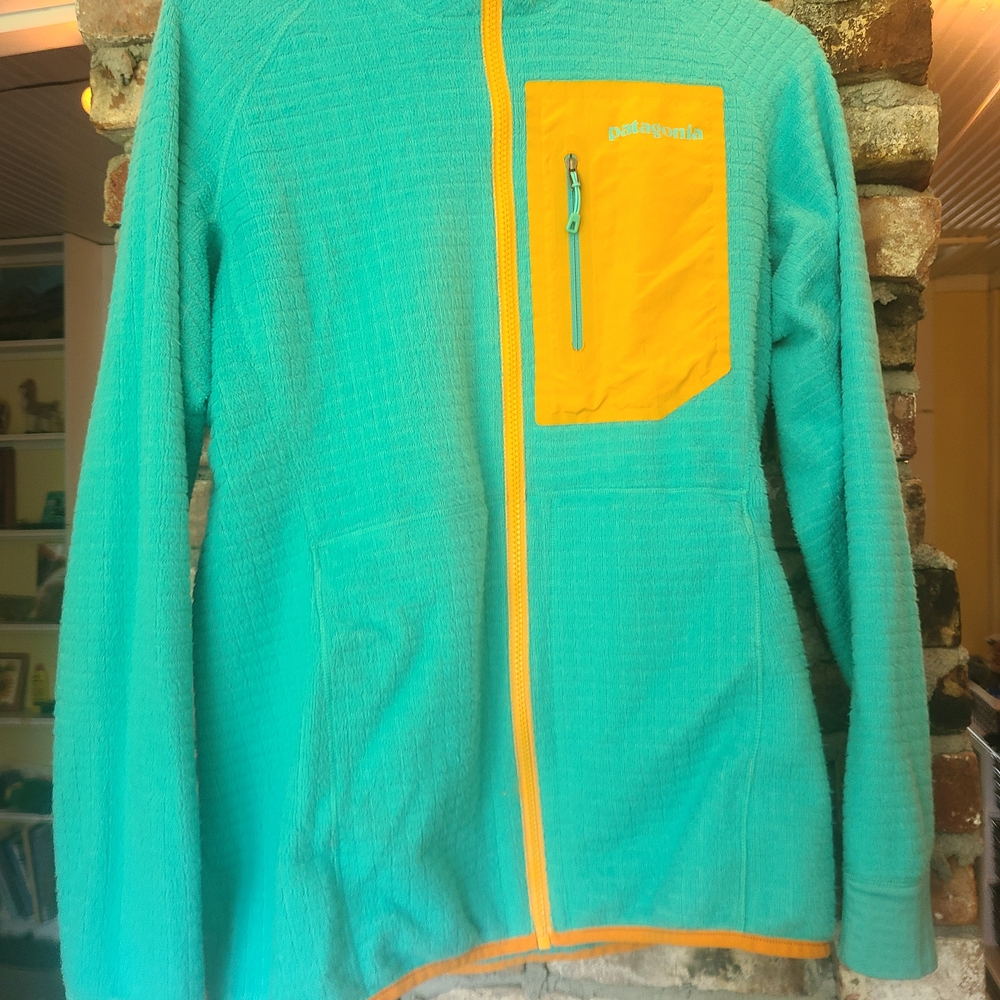 Patagonia Turquoise Jacket with Yellow Accents